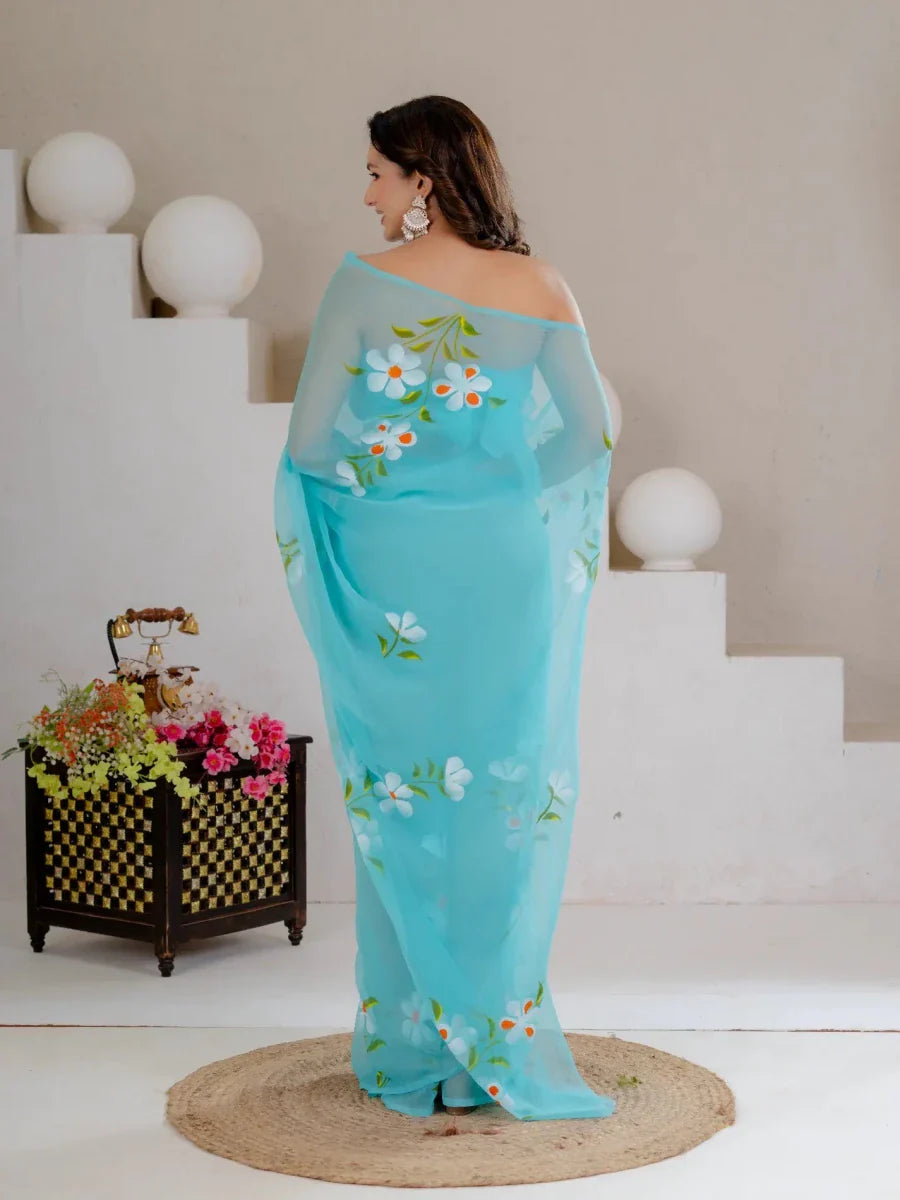 Sky Blue Hand Painted Georgette Saree with White Hibiscus Floral Print