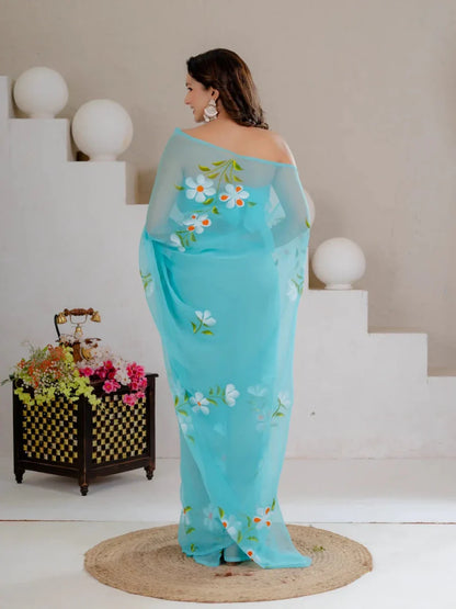 Sky Blue Hand Painted Georgette Saree with White Hibiscus Floral Print