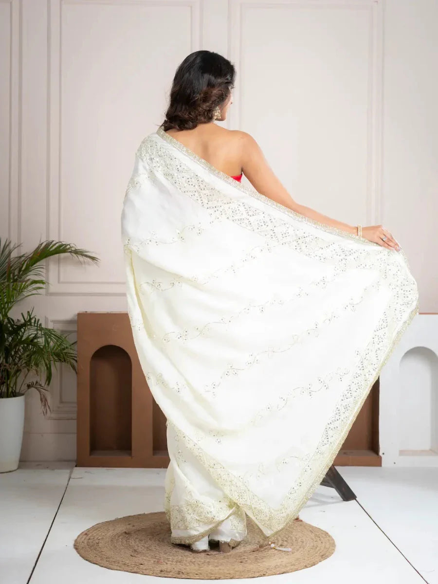 Elegant Ivory Silk Saree with Hand Embroidered Border