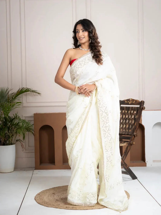 Elegant Ivory Silk Saree with Hand Embroidered Border