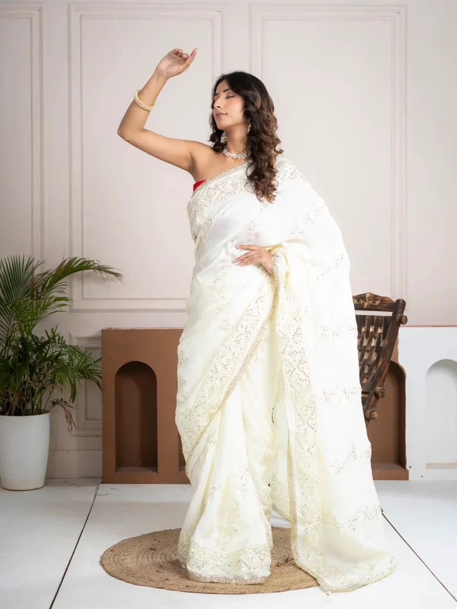 Elegant Ivory Silk Saree with Hand Embroidered Border